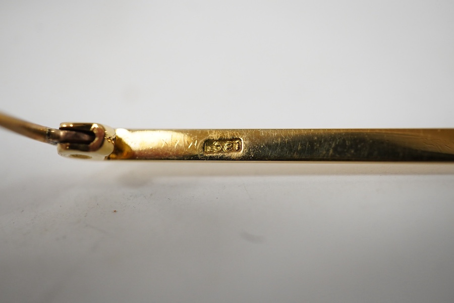 An 18ct tie pin, 51mm, 3.5 grams. Condition - fair to good